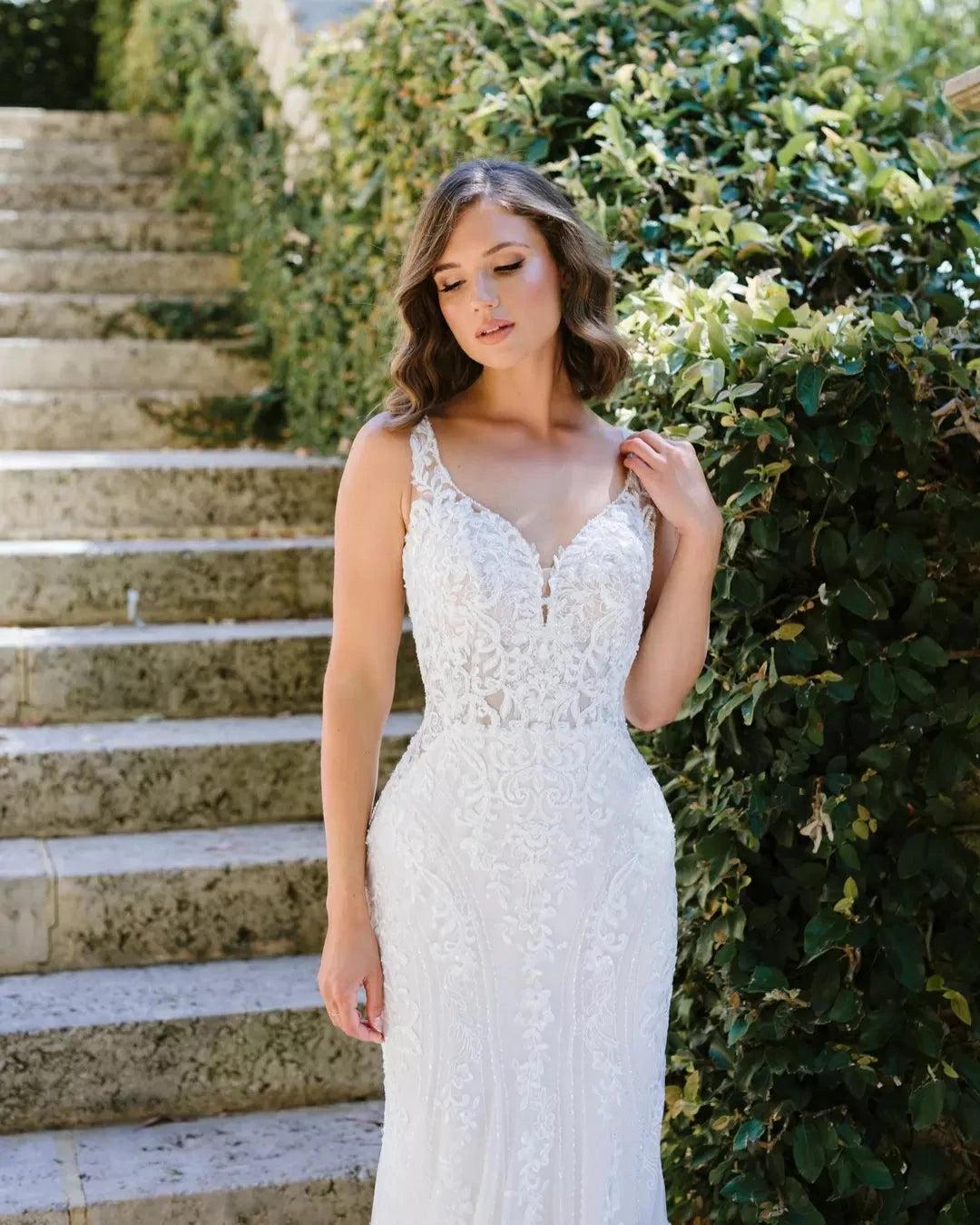 Ivory Lace Applique Mermaid Wedding Dress V-Neck Sleeveless Open Back Sweep Train Bridal Gown