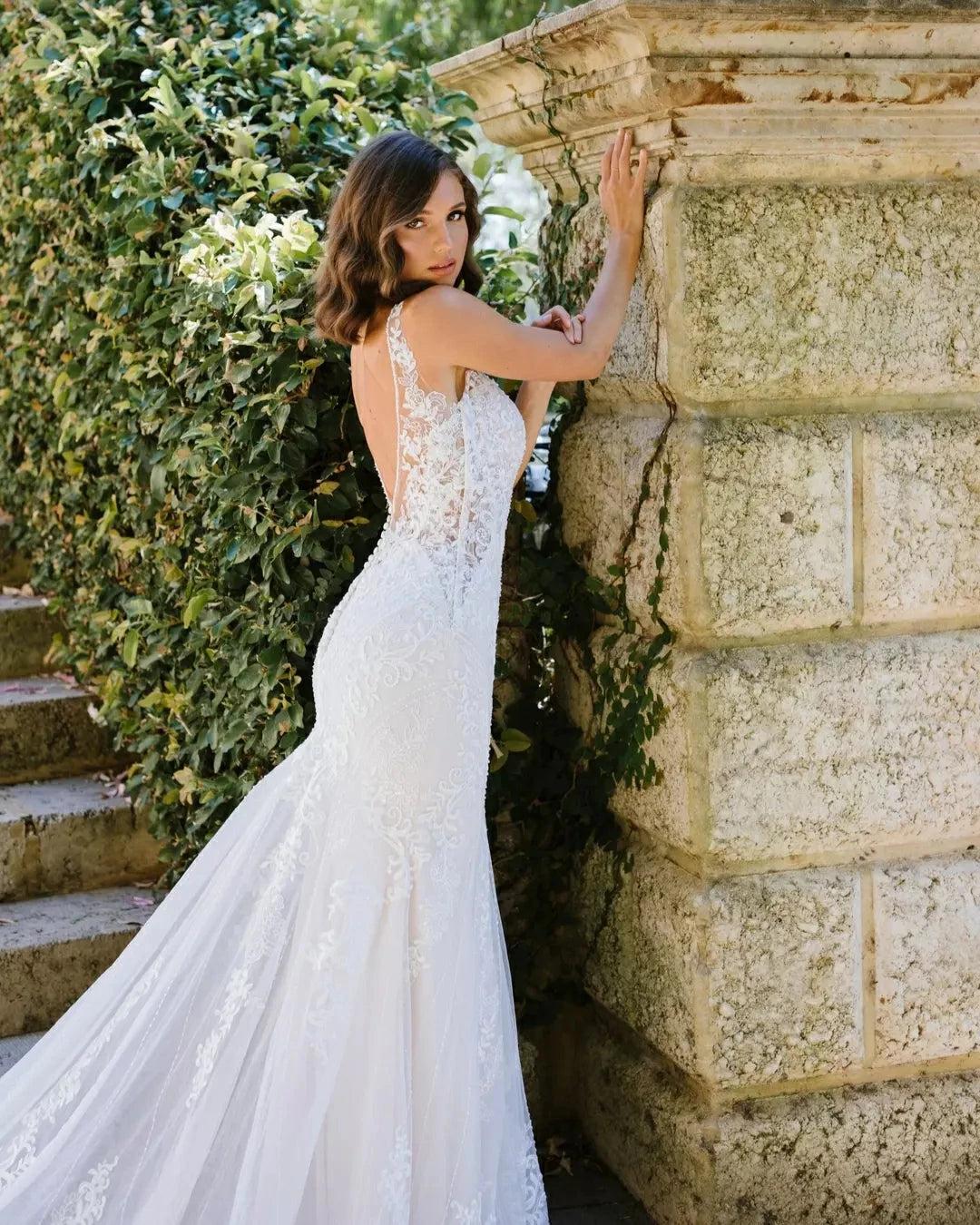 Ivory Lace Applique Mermaid Wedding Dress V-Neck Sleeveless Open Back Sweep Train Bridal Gown