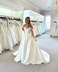 Ivory Satin A-line Wedding Dress Off-the-shoulder Sweetheart Corset Bodice Lace Applique Button Back Cathedral Train Bridal Gown