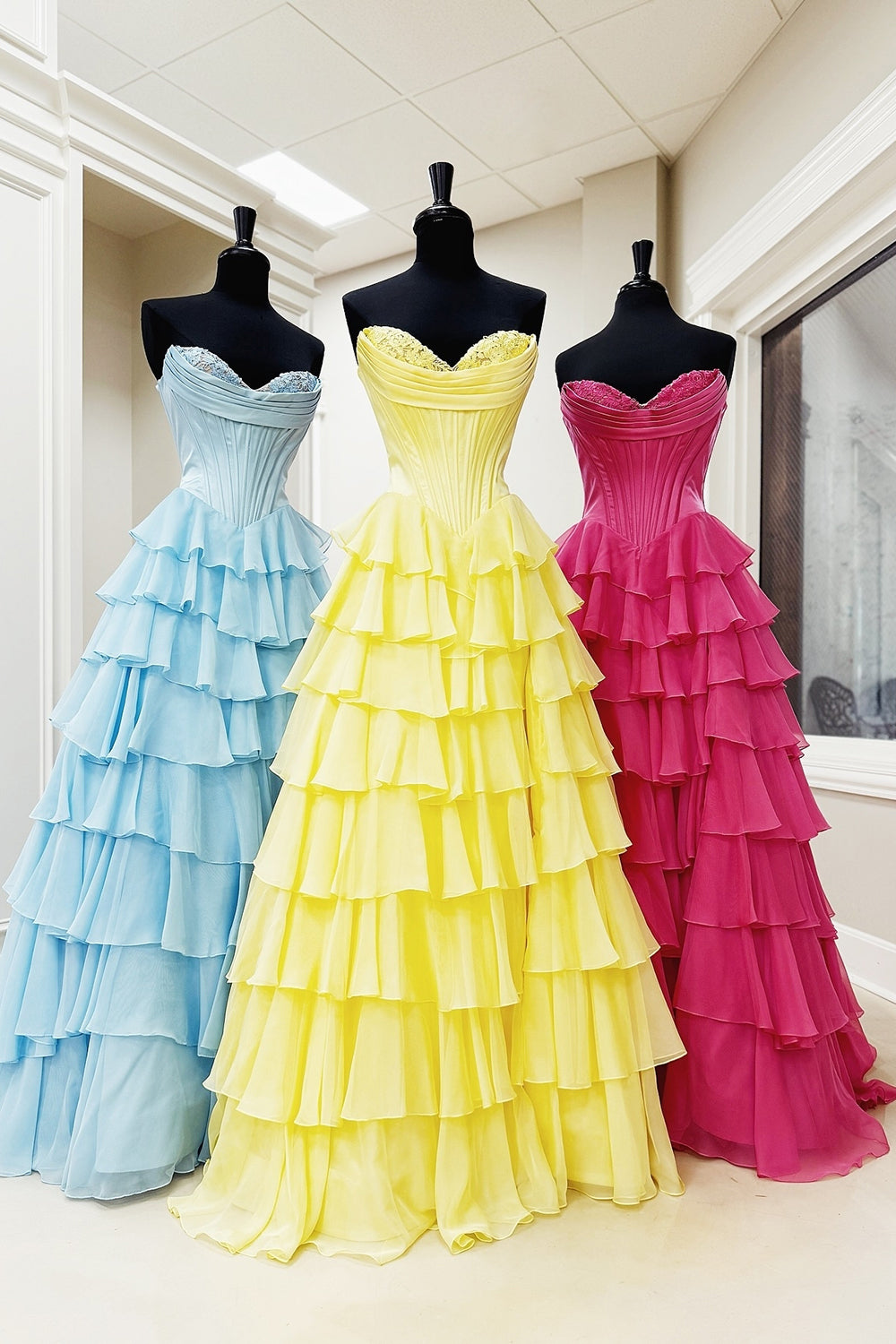 Long Corset Prom Dress in Fuchsia with Sweetheart Neckline and Ruffled Chiffon Slit