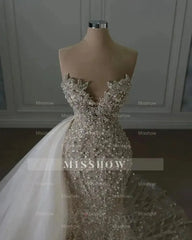 Luxurious Ivory Sweetheart Mermaid Wedding Dress with Beaded Lace and Sequins - Sleeveless Bridal Gown