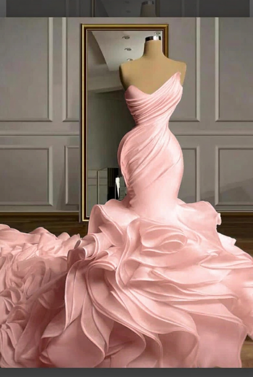 Blushing pink strapless ruffled mermaid wedding dress