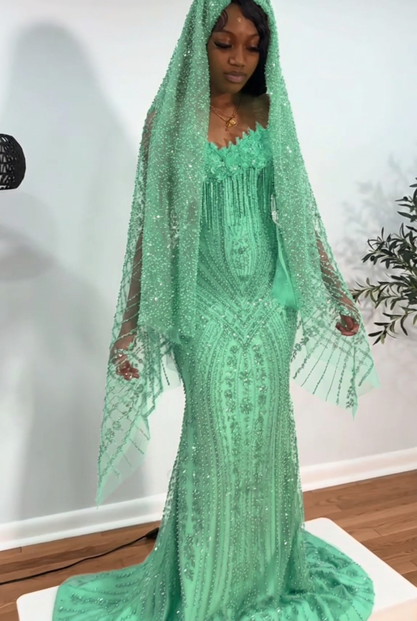 Mint green strapless beaded mermaid prom dress