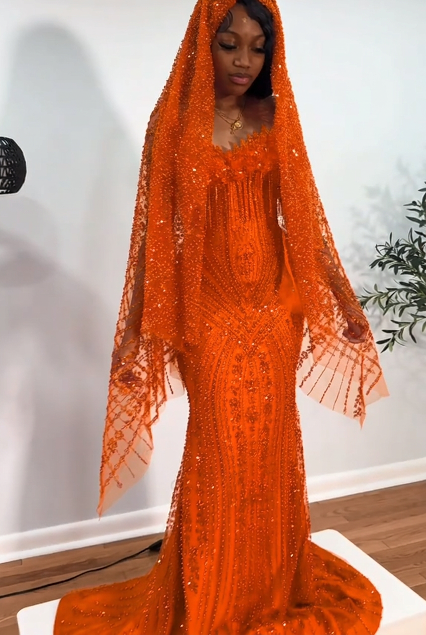 Orange strapless beaded mermaid prom dress