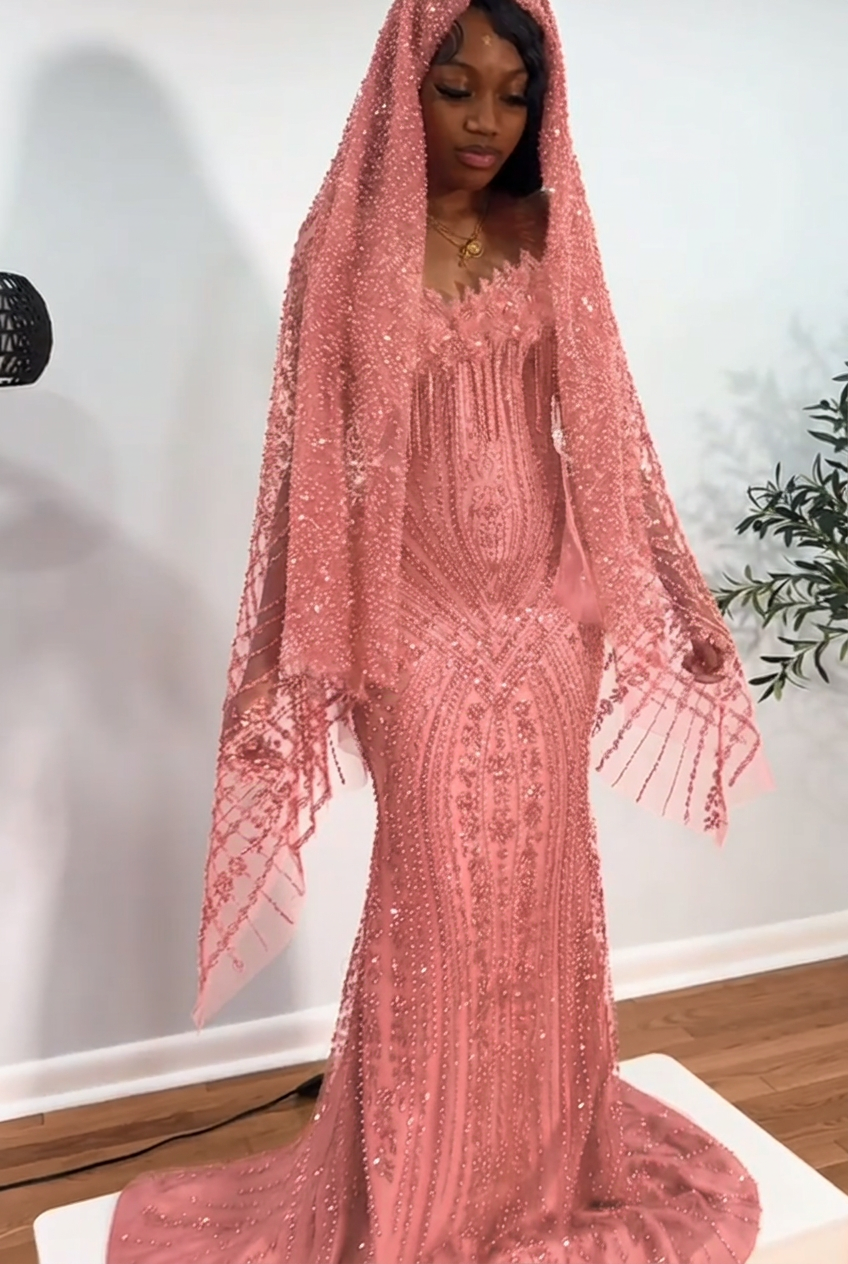 Blushing pink strapless beaded mermaid prom dress