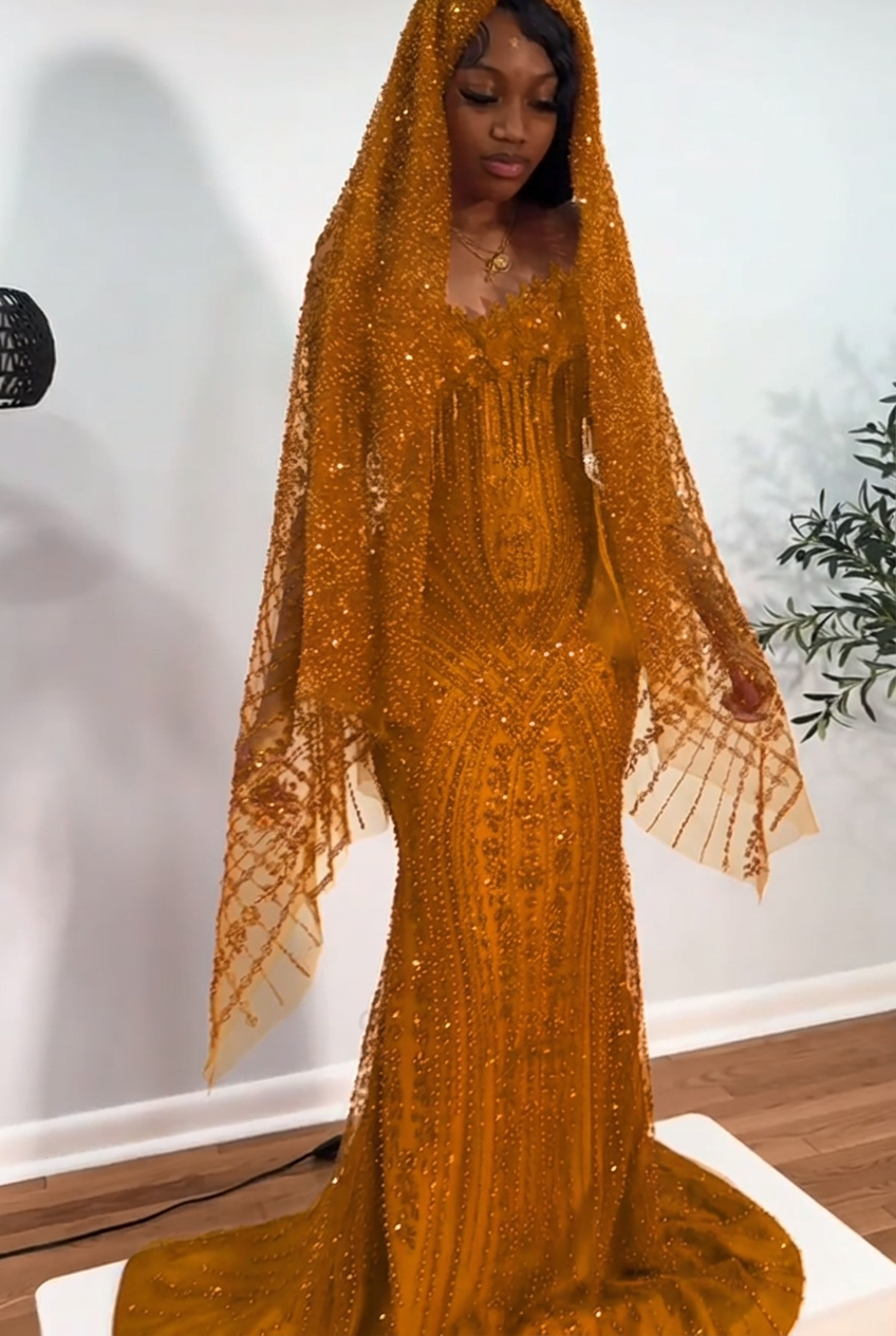Gold strapless beaded mermaid prom dress