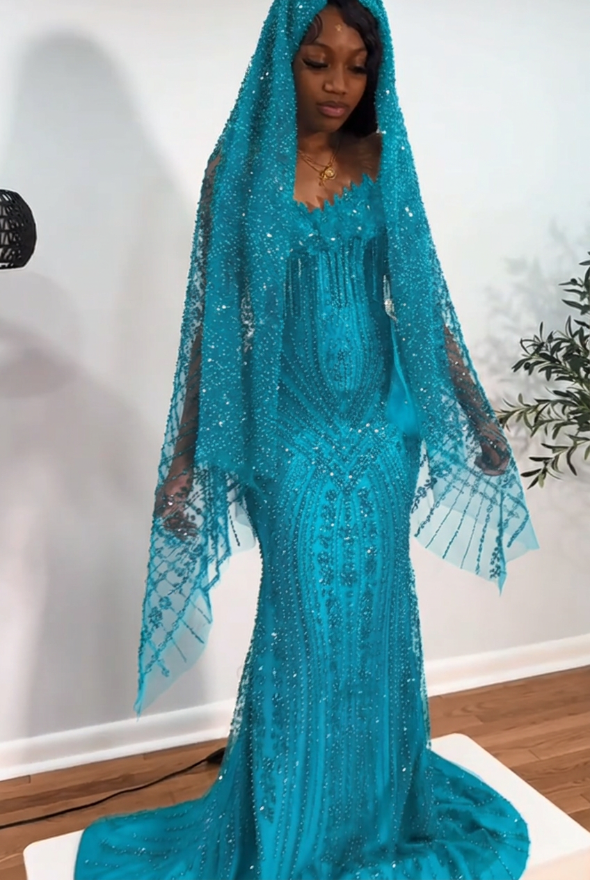 Turquoise strapless beaded mermaid prom dress