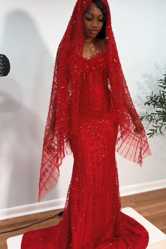 Red strapless beaded mermaid prom dress