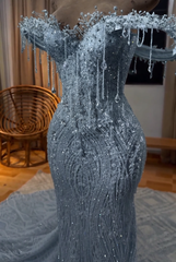 Dusty blue off-the-shoulder beaded mermaid prom dress
