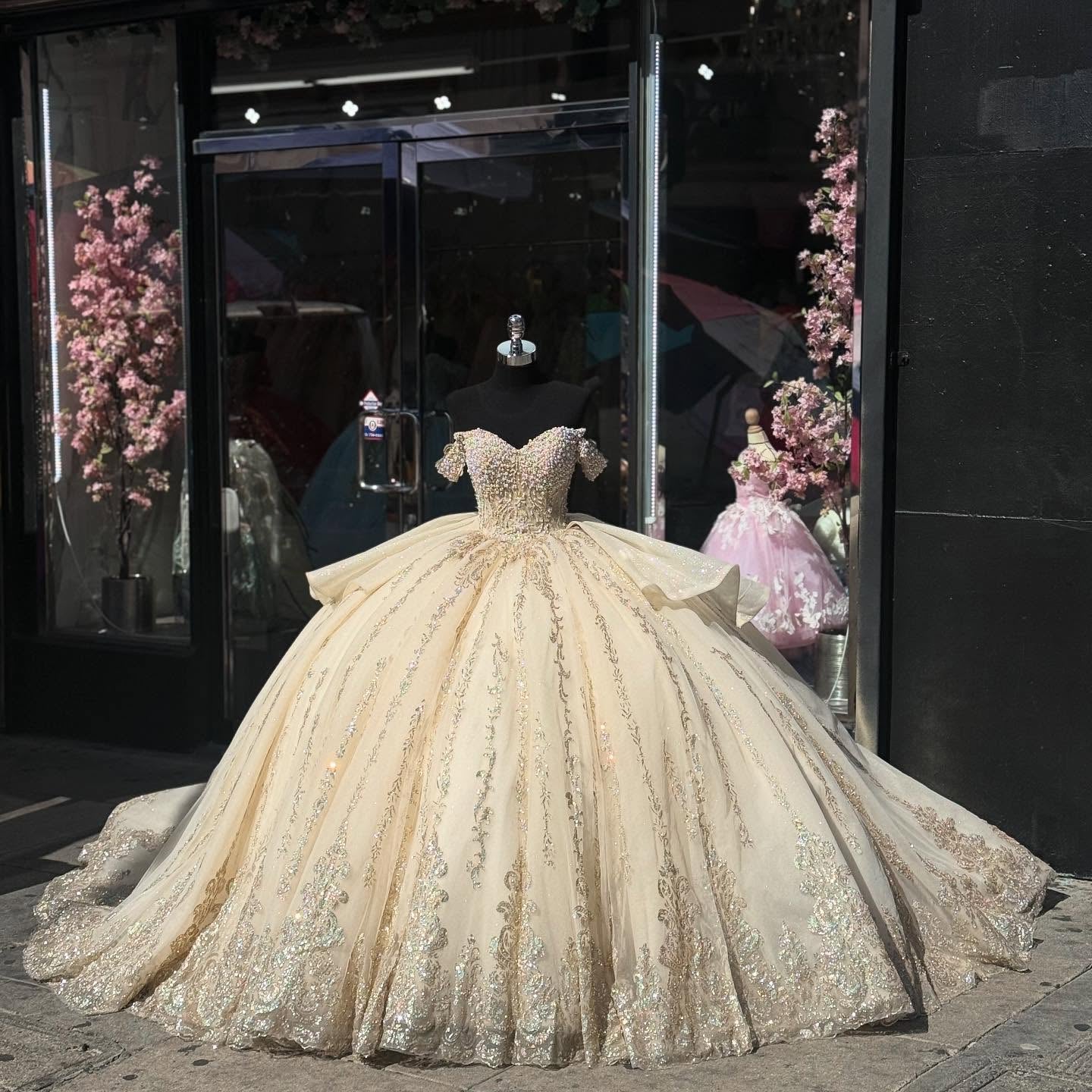 Misshow Champagne Gold Beaded Ball Gown Off-Shoulder Sleeveless Quinceanera Dress with Tulle Skirt & Bow Detail for Sweet 16 Birthday & Formal Events