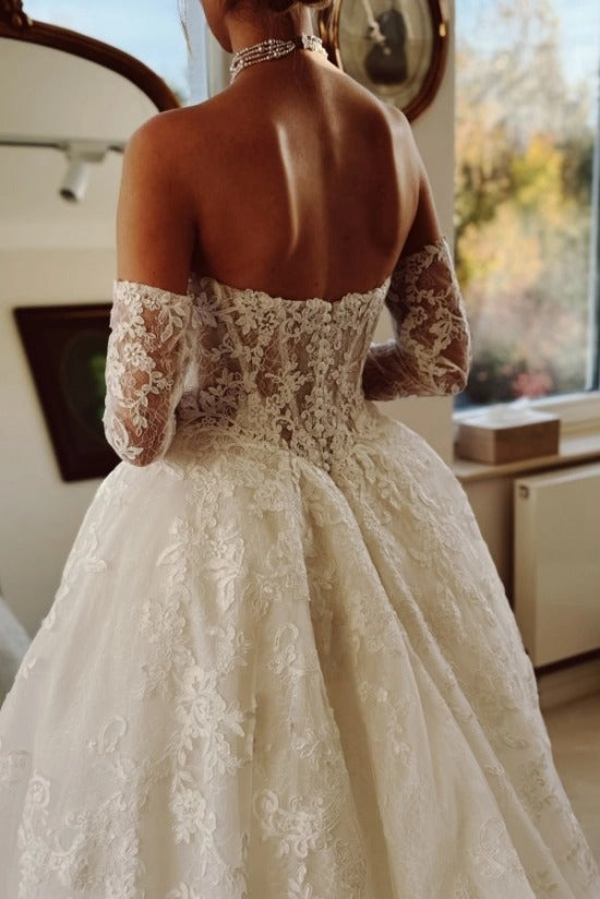 Off-Shoulder Sweetheart Illusion Visible Boning Lace-Up Corset Pearl Chain Cascade Bust 3D Lace Floral Appliqué Long Sleeve Ball Gown Wedding Dress Cathedral Train