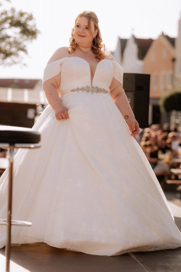 White v-neck rhinestone ball gown wedding dress