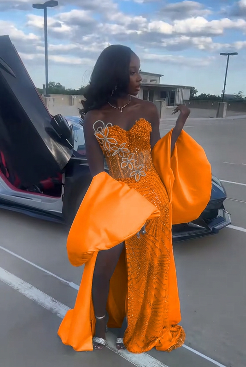 Orange strapless beaded mermaid prom dress