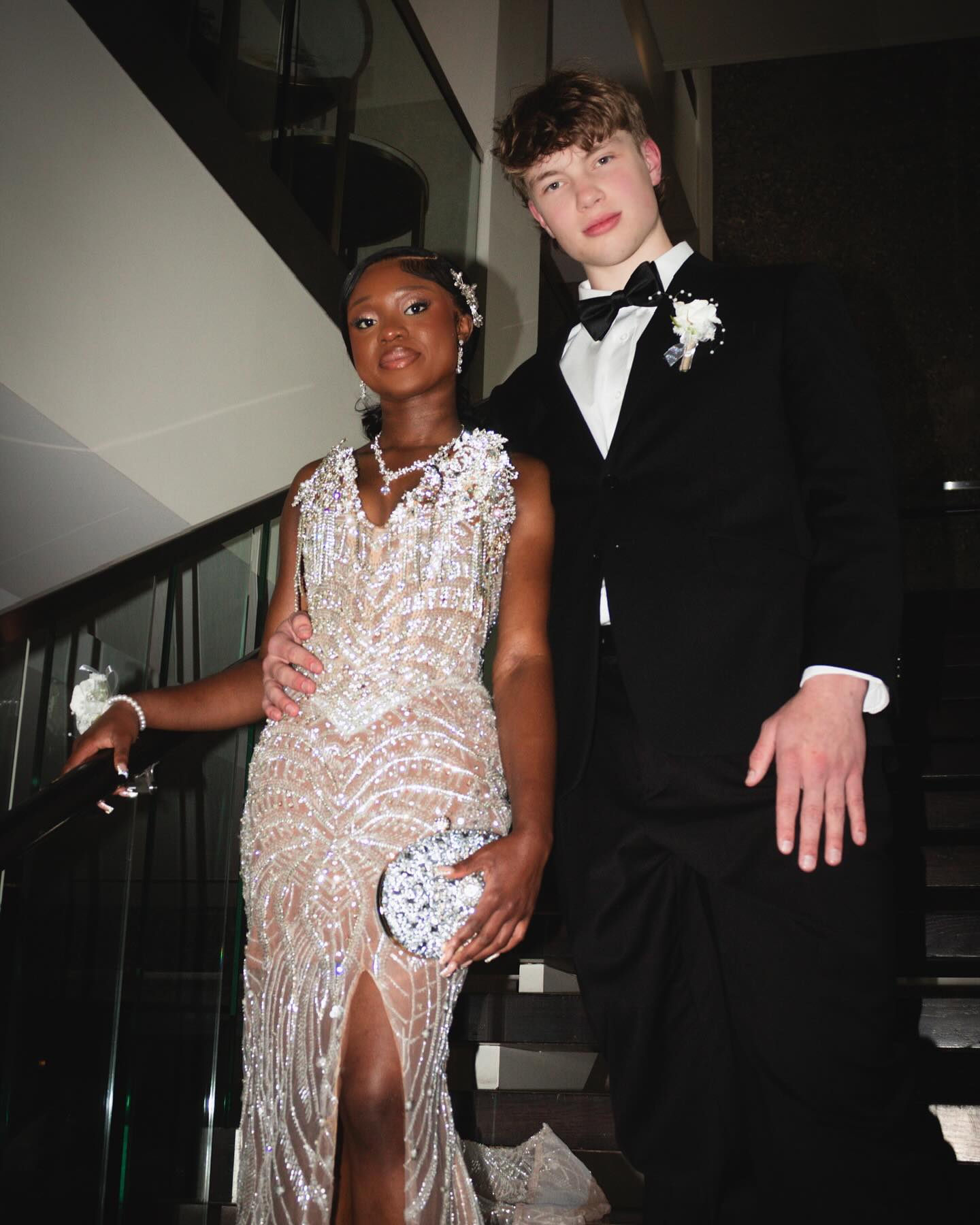 Silver Mermaid Prom Dress Deep V Sweetheart Sheer Illusion Boned Corset 3D Silver Rhinestone Crystal Floral Cluster Shoulder Heavy Silver Rhinestone Crystal Fringe Chain Tassel Silver Baroque Scroll Vine Beading Sequin High Split Sweep Train Gown