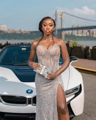 Silver Sequin Mermaid Prom Dress Halter Sweetheart Sheer Illusion Boned Corset Vertical Pearl Strand Crystal Rhinestone Beaded Bodice All-Over Sequin Rhinestone Skirt High Split Sweep Train Gown