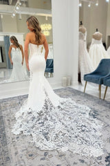 Strapless Plunging Sweetheart Illusion Sheer Boned Corset Stretch Satin Button Back Mermaid Wedding Dress Oversized Lace Appliqué Cathedral Train