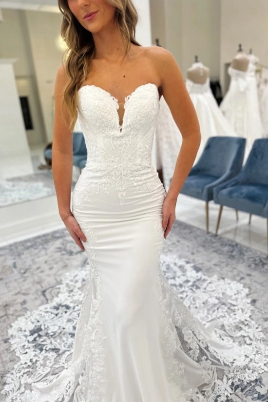 Strapless Plunging Sweetheart Illusion Sheer Boned Corset Stretch Satin Button Back Mermaid Wedding Dress Oversized Lace Appliqué Cathedral Train