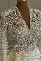 Tailored Ivory V-Neck Long Sleeves Mermaid Wedding Dress with Beads and Detachable Train