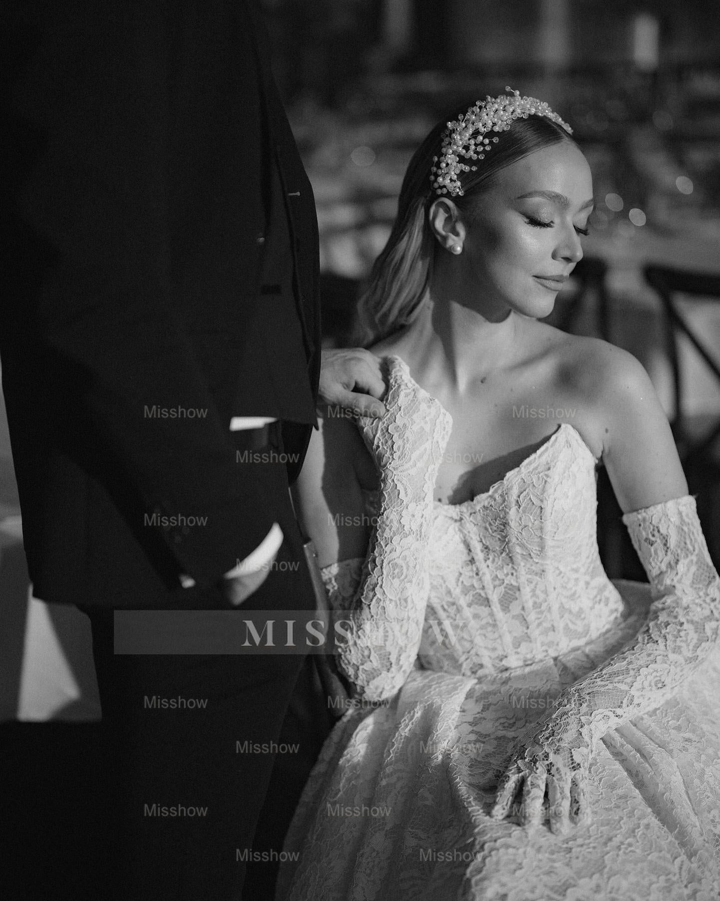 White strapless lace ball gown wedding dress