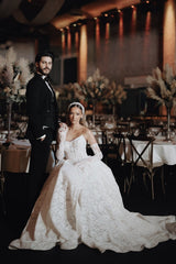 White strapless lace ball gown wedding dress