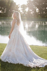 White 3D Floral Lace A-Line Wedding Dress V-Neck Spaghetti Straps Allover 3D Flower Leaf Applique Open Back Voluminous Skirt Cathedral Train Bridal Gown