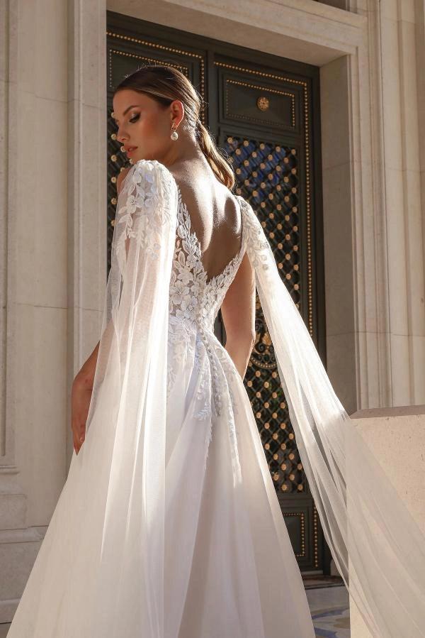 White A-Line Wedding Dress Deep V Plunge Sheer Illusion Boned Corset White Floral Lace Embroidery 3D White Floral Applique Wide Illusion Shoulder Strap Deep V Open Back All-Over Floral Lace Tulle Detachable Cathedral Tulle Cape Cathedral Train Bridal Gown