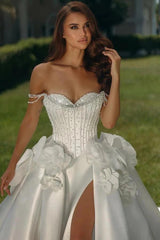 White Satin Ball Gown Wedding Dress Off-the-Shoulder Sweetheart Crystal Pearl Beaded Corset Bodice Boning Detail Crystal Pearl Chain Straps Oversized 3D Satin Flower Thigh-High Slit Royal Cathedral Train Bridal Gown