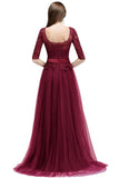 Looking for Prom Dresses,Evening Dresses in Tulle, A-line style, and Gorgeous Appliques,Ribbons,Split Front work  MISSHOW has all covered on this elegant NANA, A-line Half Sleeves Floor Length Slit Appliqued Tulle Prom Dresses with Sash