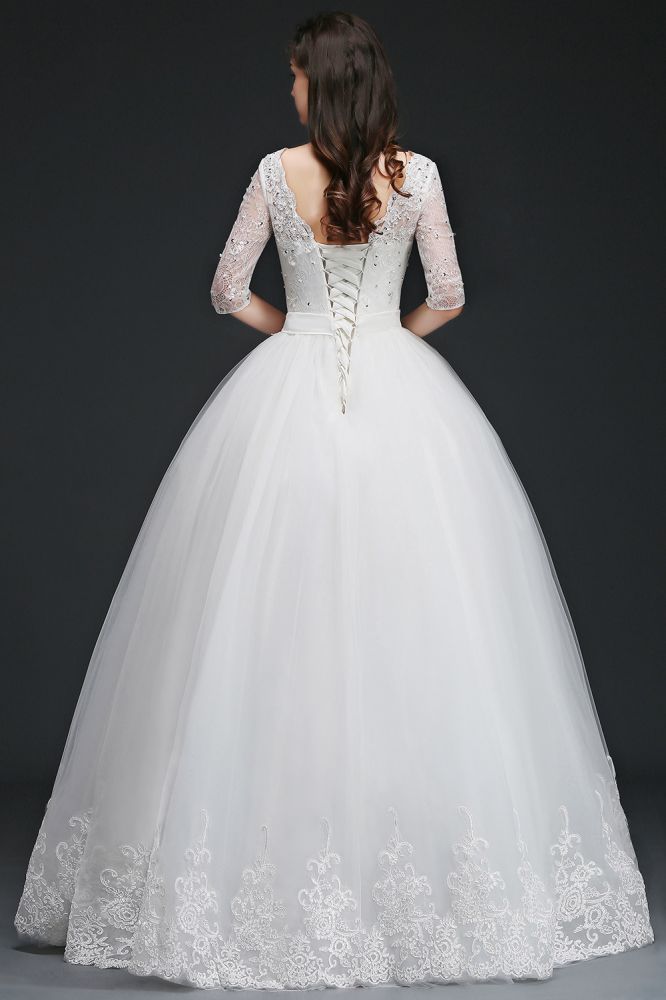 This elegant Jewel Tulle wedding dress with Appliques could be custom made in plus size for curvy women. Plus size Half-Sleeves Ball Gown bridal gowns are classic yet cheap.