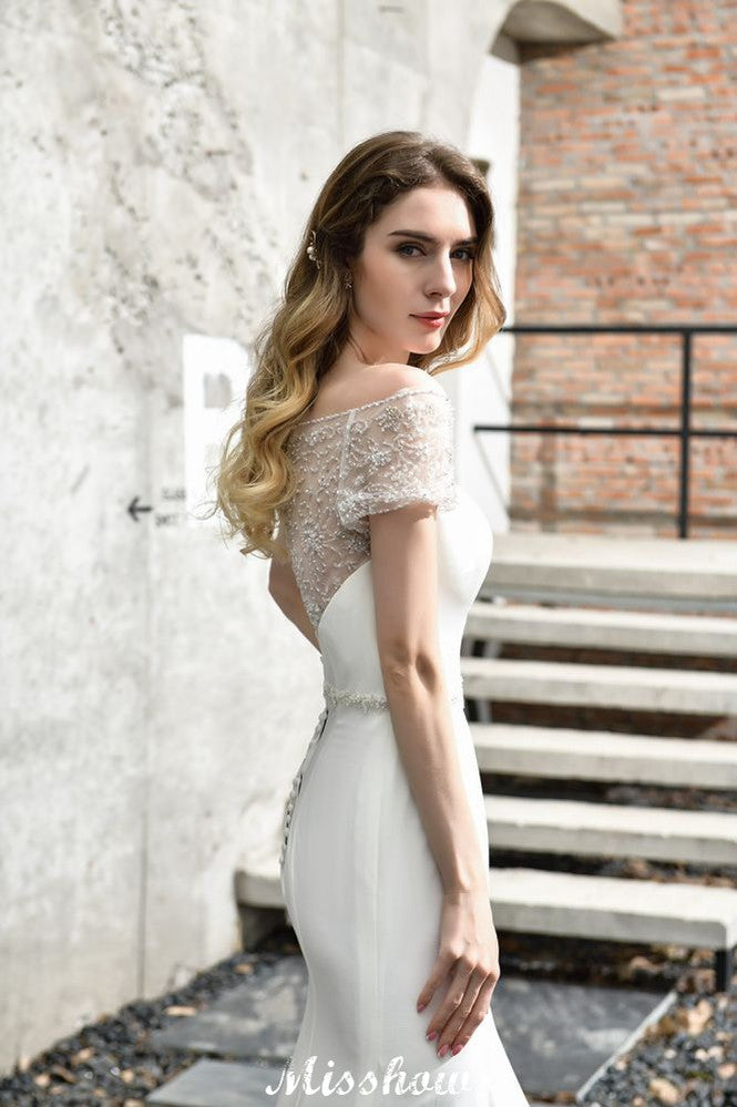 MISSHOW offers Bateau Short Sleeve Slim Mermaid Wedding Gown Satin Bridal Gown Sweep/Trump Train at a good price from Ivory,Satin to Mermaid Floor-length them. Stunning yet affordable Short Sleeves .