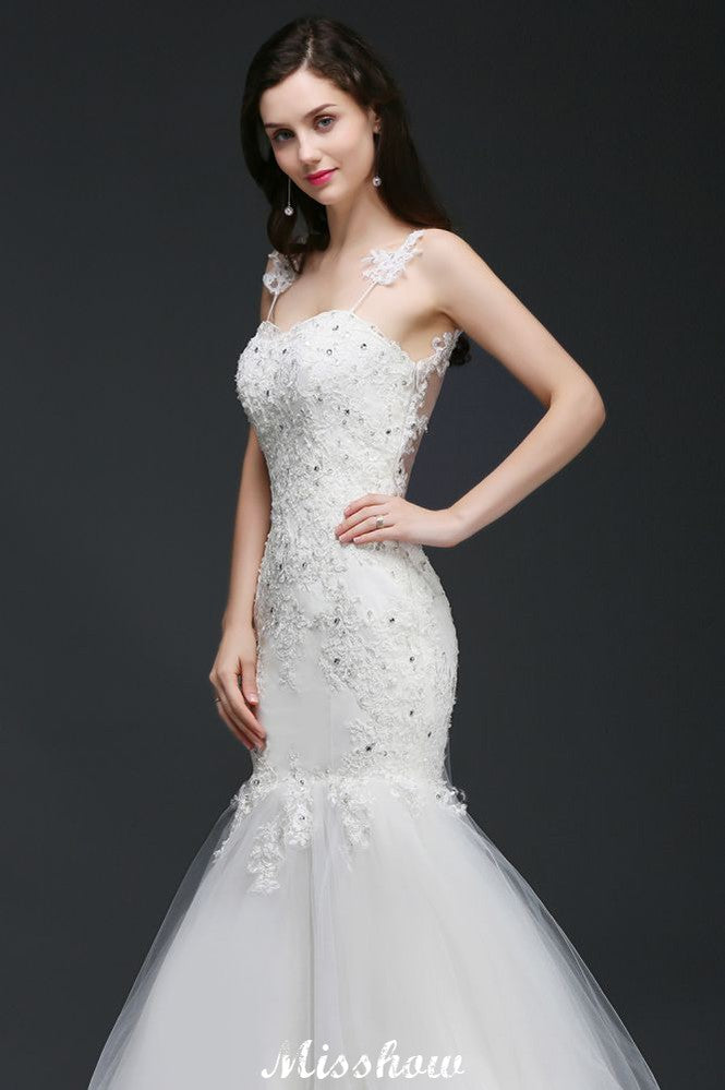 This elegant Spaghetti Straps Tulle wedding dress with Crystal Floral Pin could be custom made in plus size for curvy women. Plus size Sleeveless Mermaid bridal gowns are classic yet cheap.
