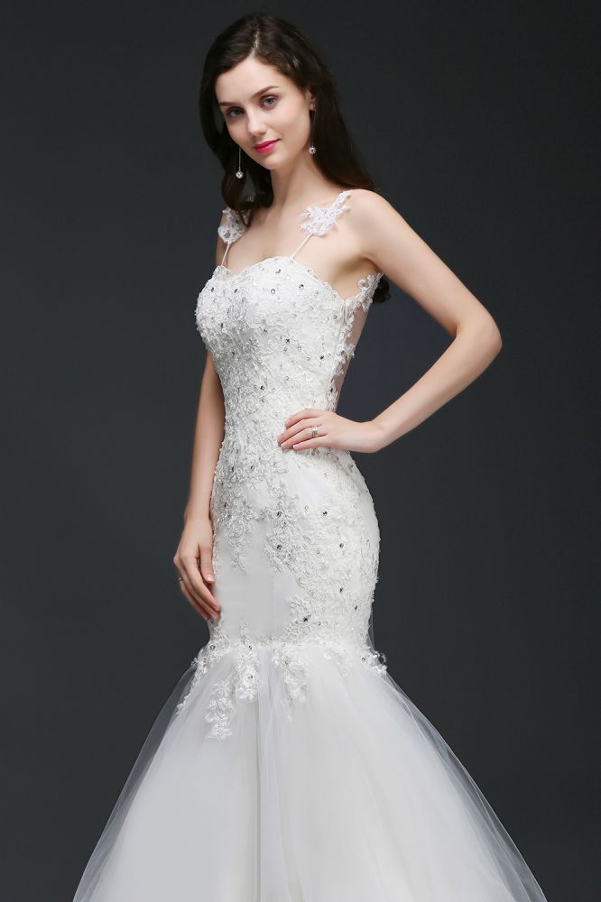 This elegant Spaghetti Straps Tulle wedding dress with Crystal Floral Pin could be custom made in plus size for curvy women. Plus size Sleeveless Mermaid bridal gowns are classic yet cheap.