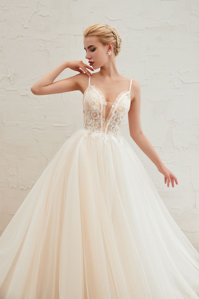 This elegant V-neck,Spaghetti Straps Tulle wedding dress with Lace,Beading,Pearls could be custom made in plus size for curvy women. Plus size Sleeveless A-line,Ball Gown bridal gowns are classic yet cheap.