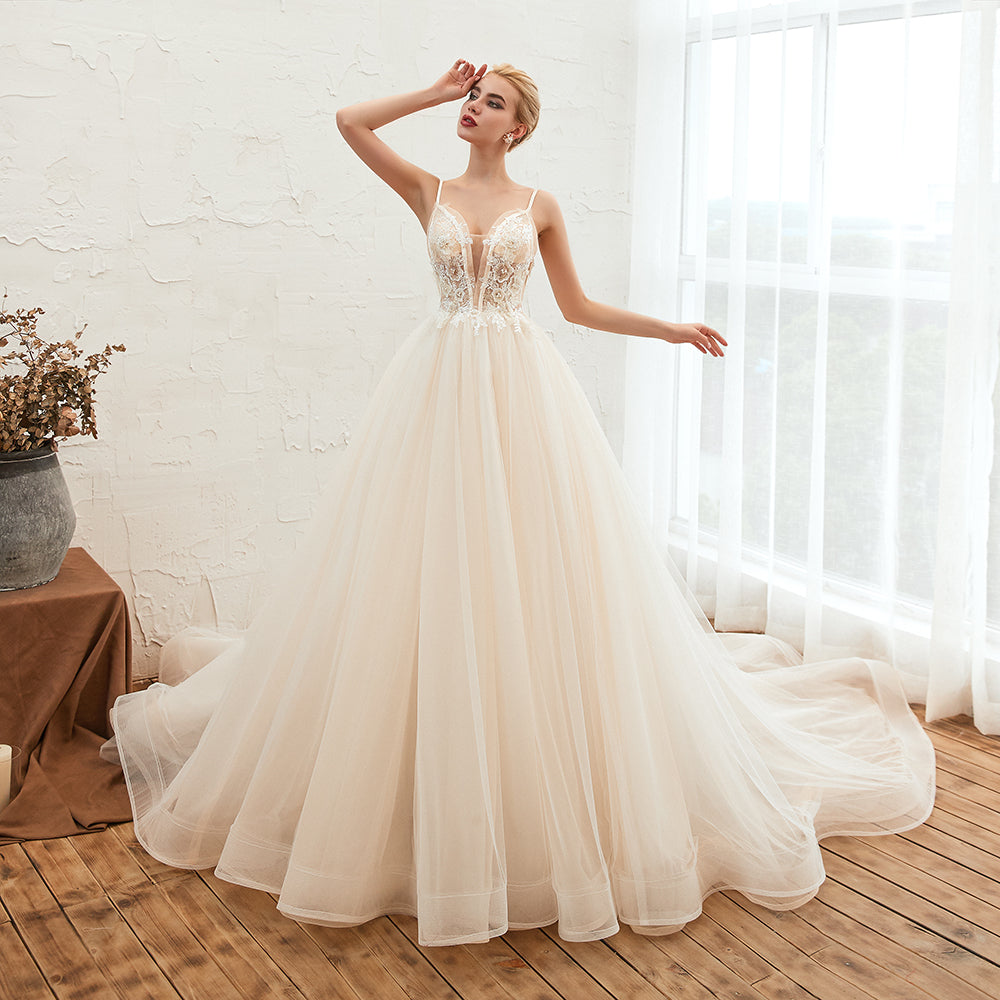 This elegant V-neck,Spaghetti Straps Tulle wedding dress with Lace,Beading,Pearls could be custom made in plus size for curvy women. Plus size Sleeveless A-line,Ball Gown bridal gowns are classic yet cheap.