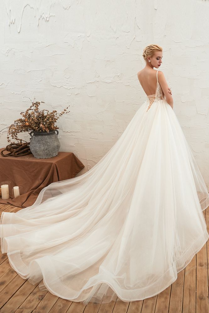 This elegant V-neck,Spaghetti Straps Tulle wedding dress with Lace,Beading,Pearls could be custom made in plus size for curvy women. Plus size Sleeveless A-line,Ball Gown bridal gowns are classic yet cheap.