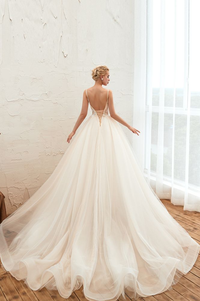 This elegant V-neck,Spaghetti Straps Tulle wedding dress with Lace,Beading,Pearls could be custom made in plus size for curvy women. Plus size Sleeveless A-line,Ball Gown bridal gowns are classic yet cheap.