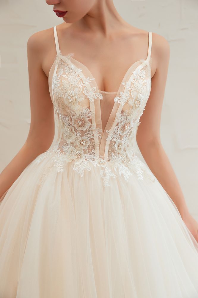 This elegant V-neck,Spaghetti Straps Tulle wedding dress with Lace,Beading,Pearls could be custom made in plus size for curvy women. Plus size Sleeveless A-line,Ball Gown bridal gowns are classic yet cheap.