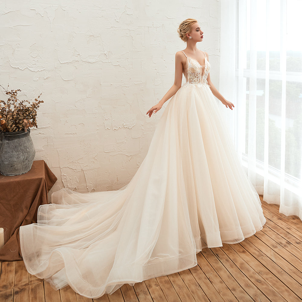 This elegant V-neck,Spaghetti Straps Tulle wedding dress with Lace,Beading,Pearls could be custom made in plus size for curvy women. Plus size Sleeveless A-line,Ball Gown bridal gowns are classic yet cheap.