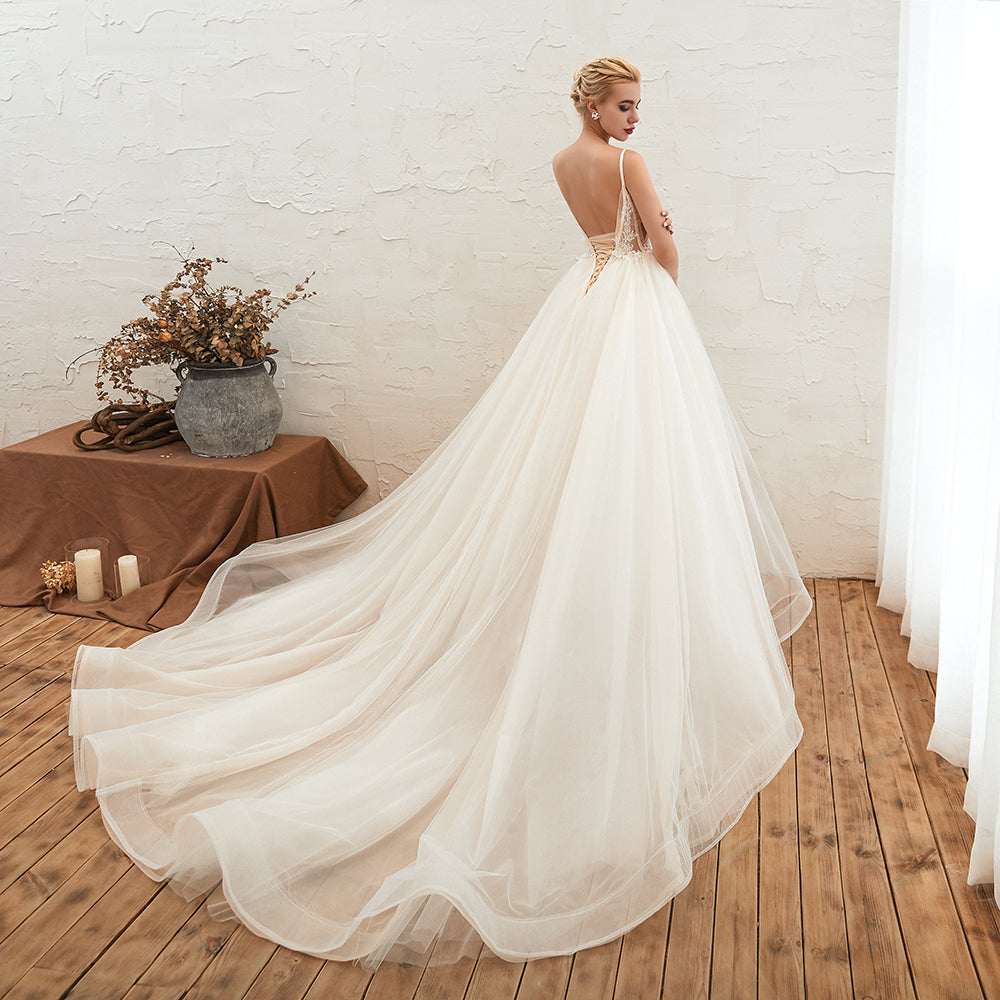 This elegant V-neck,Spaghetti Straps Tulle wedding dress with Lace,Beading,Pearls could be custom made in plus size for curvy women. Plus size Sleeveless A-line,Ball Gown bridal gowns are classic yet cheap.