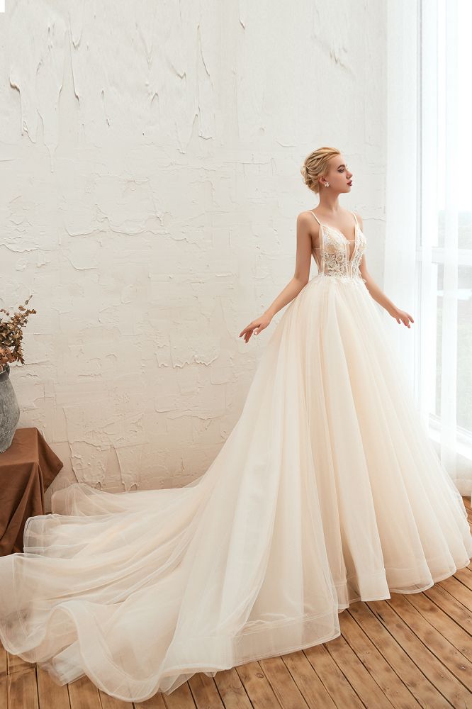 This elegant V-neck,Spaghetti Straps Tulle wedding dress with Lace,Beading,Pearls could be custom made in plus size for curvy women. Plus size Sleeveless A-line,Ball Gown bridal gowns are classic yet cheap.