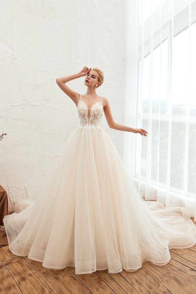 This elegant V-neck,Spaghetti Straps Tulle wedding dress with Lace,Beading,Pearls could be custom made in plus size for curvy women. Plus size Sleeveless A-line,Ball Gown bridal gowns are classic yet cheap.