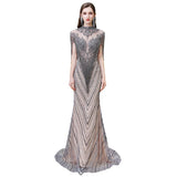 The gorgeous Cap Sleeves High Neck Sparkly Beads Floor-Length Mermaid Evening Party Gown will stun every girl. The Tulle Vintage Party dress will add extra elegance to your wholesale look.