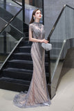 The gorgeous Cap Sleeves High Neck Sparkly Beads Floor-Length Mermaid Evening Party Gown will stun every girl. The Tulle Vintage Party dress will add extra elegance to your wholesale look.