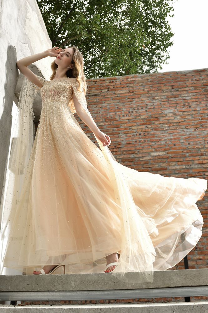 Looking for Prom Dresses,Evening Dresses,Homecoming Dresses,Quinceanera dresses in Tulle, A-line style, and Gorgeous Beading work  MISSHOW has all covered on this elegant Charming Tulle Floor Length Evening Party Dress Sparkly Beads Prom Dress with Back Cape.