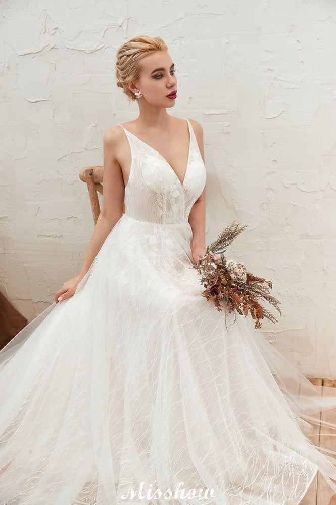 MISSHOW offers Chic Deep V-Neck White Tulle Princess Open Back Wedding Dress with Court Train at a good price from Ivory,Tulle to A-line Floor-length them. Stunning yet affordable Sleeveless .