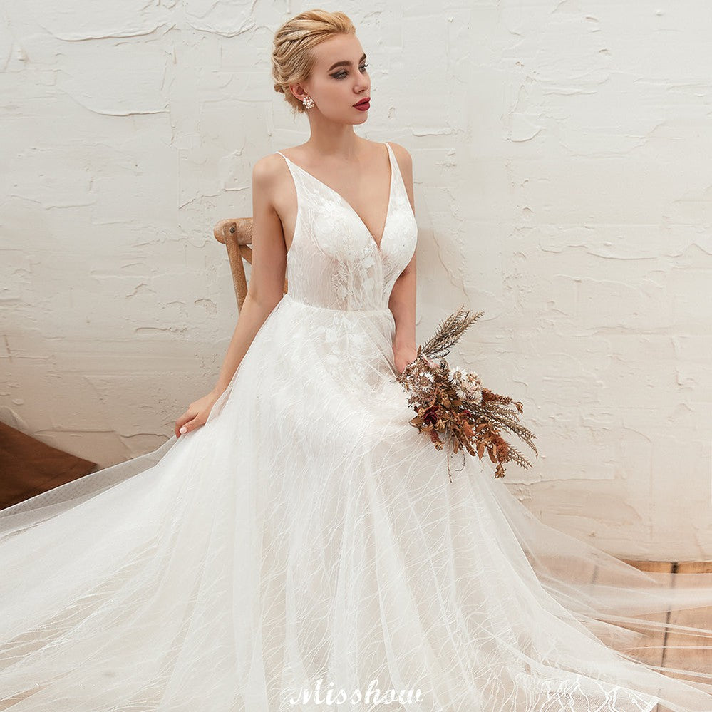 MISSHOW offers Chic Deep V-Neck White Tulle Princess Open Back Wedding Dress with Court Train at a good price from Ivory,Tulle to A-line Floor-length them. Stunning yet affordable Sleeveless .