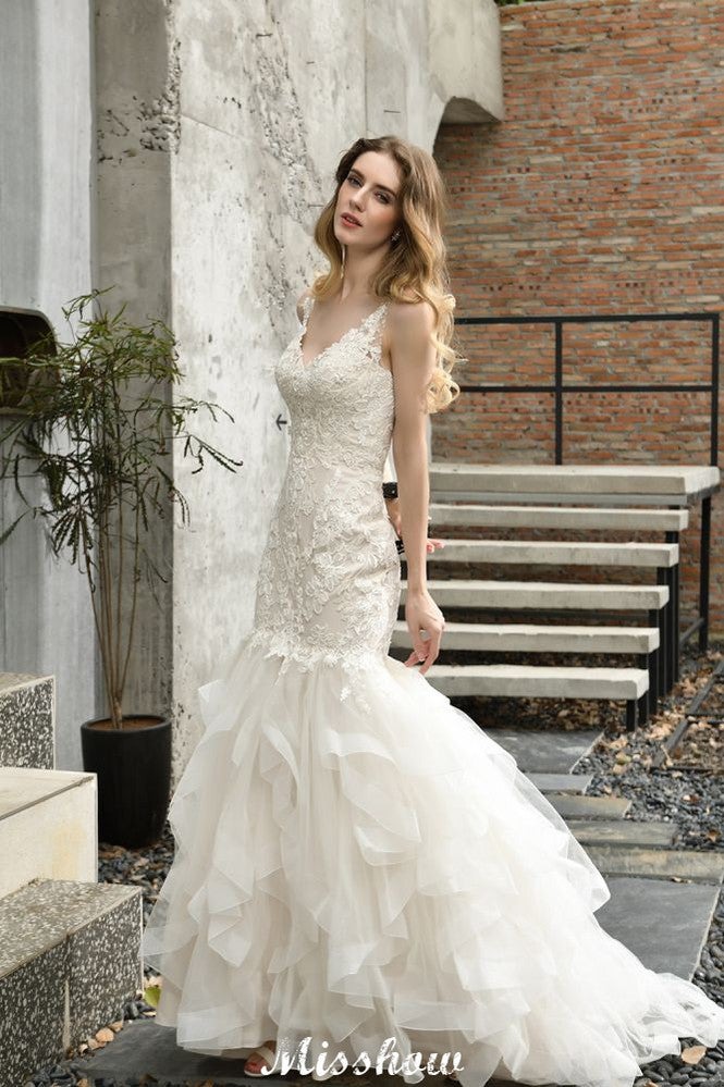 MISSHOW offers Elegant V-Neck Mermaid Bridal Gown Tulle Lace Appliques Puffy Wedding Dress at a good price from Ivory,Tulle to Mermaid Floor-length them. Stunning yet affordable Sleeveless .