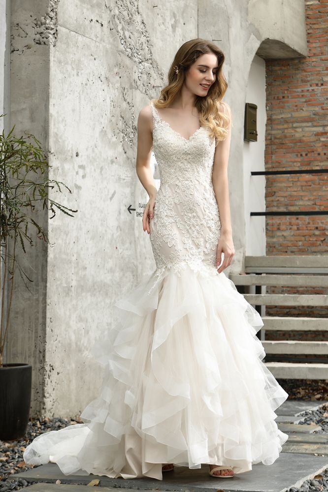 MISSHOW offers Elegant V-Neck Mermaid Bridal Gown Tulle Lace Appliques Puffy Wedding Dress at a good price from Ivory,Tulle to Mermaid Floor-length them. Stunning yet affordable Sleeveless .