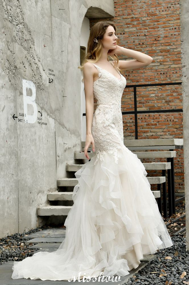 MISSHOW offers Elegant V-Neck Mermaid Bridal Gown Tulle Lace Appliques Puffy Wedding Dress at a good price from Ivory,Tulle to Mermaid Floor-length them. Stunning yet affordable Sleeveless .