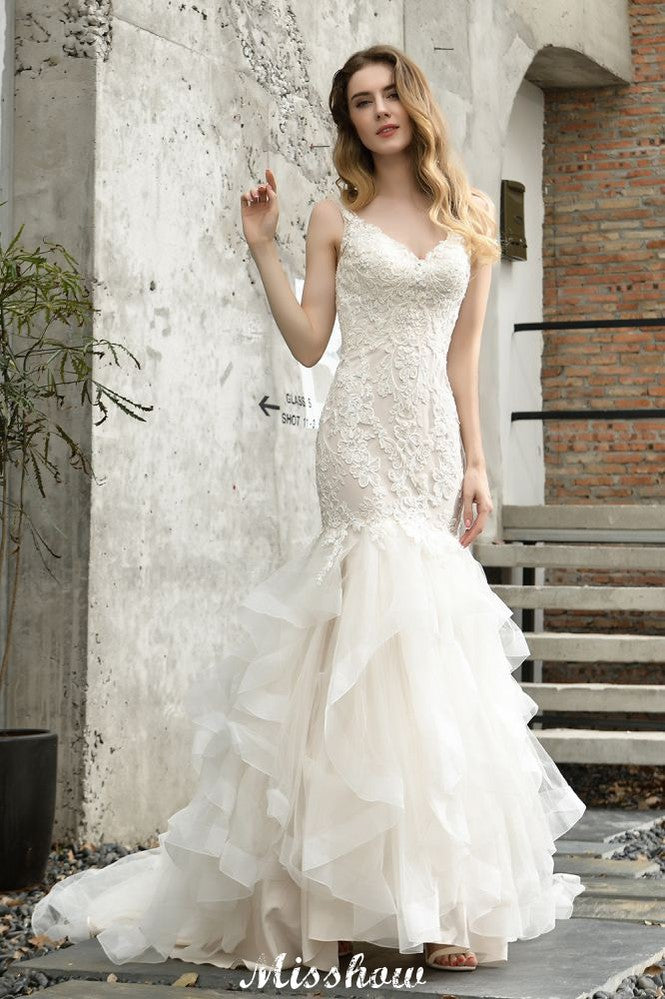 MISSHOW offers Elegant V-Neck Mermaid Bridal Gown Tulle Lace Appliques Puffy Wedding Dress at a good price from Ivory,Tulle to Mermaid Floor-length them. Stunning yet affordable Sleeveless .